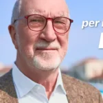 Primo piano di Bruno Costa e la scritta "Bruno Costa Sindaco"